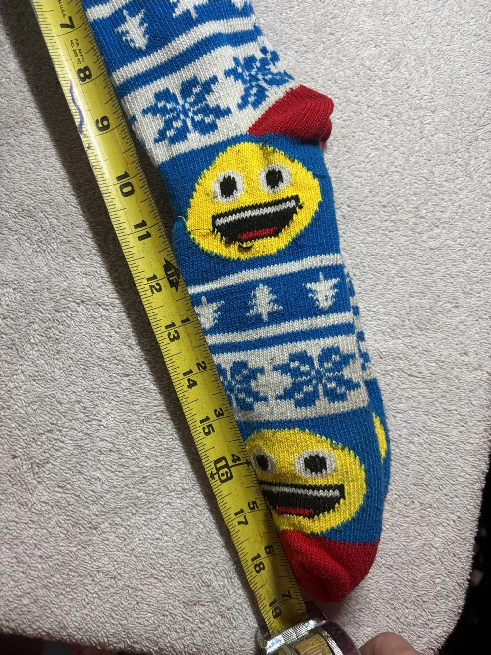 Source Unknown Blue Knit Holiday Stocking with Yellow Emoji and Red Trim